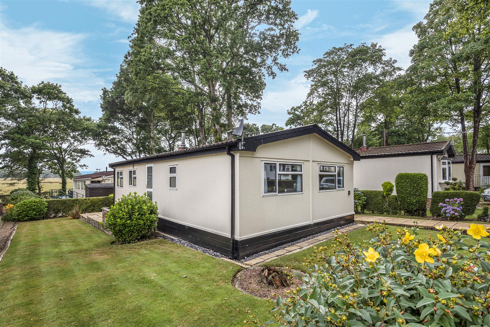 Property Details for Squirrel Walk Deanland Wood Park East Sussex BN27